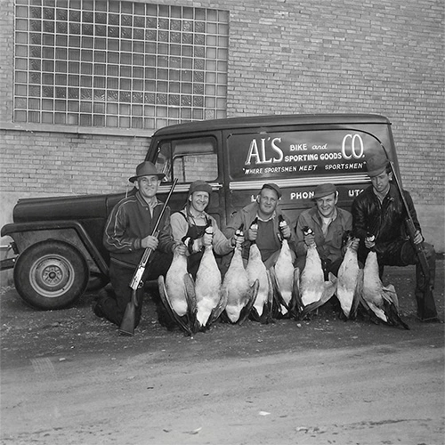 mens holding fish