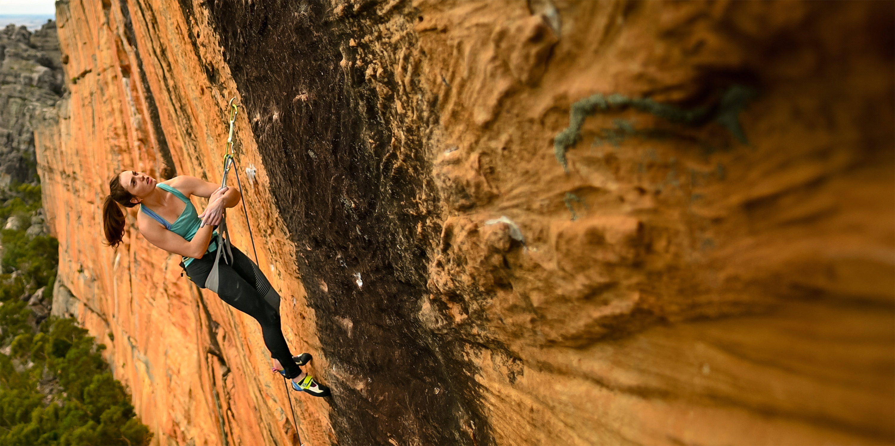 Image of a woman climbing